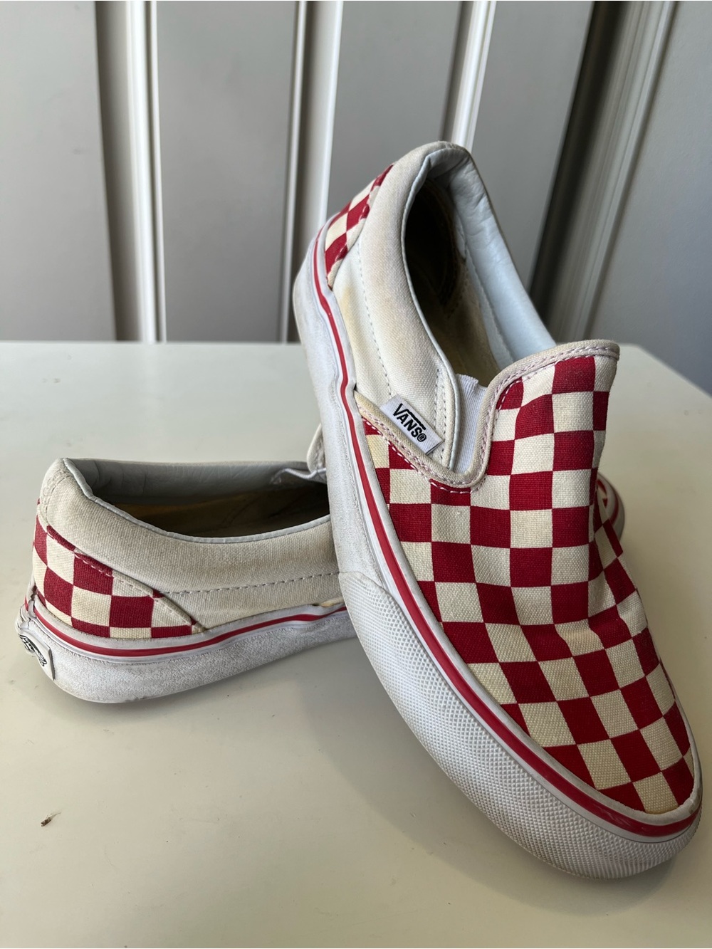 Vans Red and White Checkerboard Slip-On Sneakers